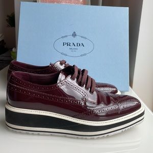 Prada Calzature Donna Granato Size 38. Burgundy patent leather platform loafer!
